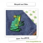 Beispielmotiv: So sieht der Froschkönig auf einem Jeansstoff gebügelt aus.